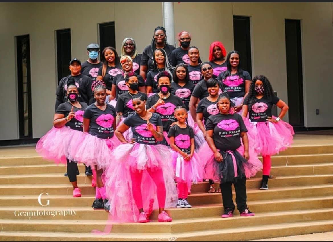 Community wearing pink at a breast cancer awareness walk